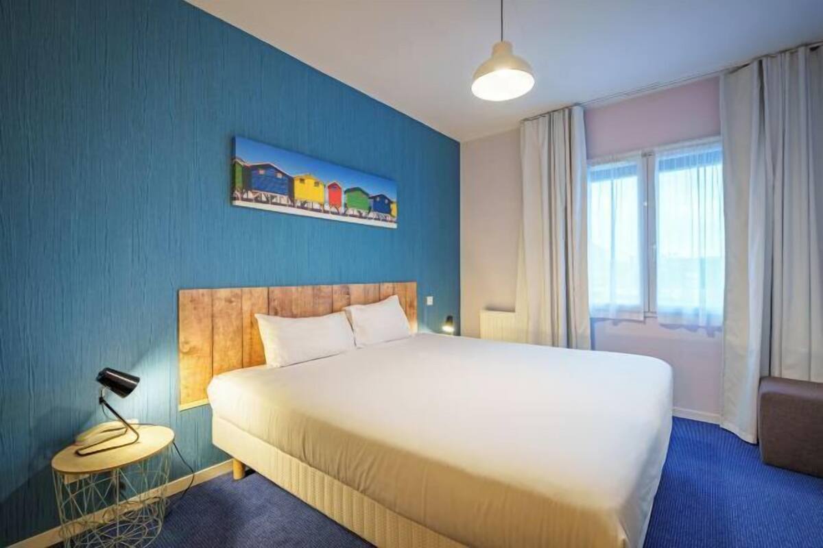 Roupas de cama premium, quartos à prova de som, Wi-Fi de cortesia