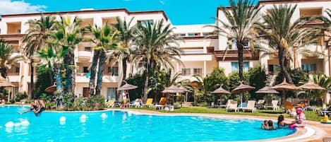 Indoor pool, outdoor pool, pool umbrellas, sun loungers