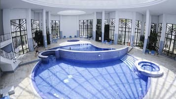 Indoor pool, outdoor pool, pool umbrellas, sun loungers