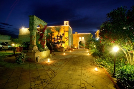 Front of property – evening/night. Relais Masseria Casina Dei Cari