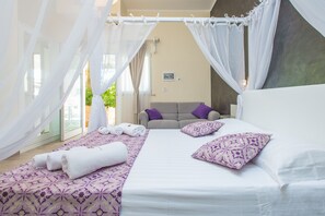 Suite exclusiva, 1 cama de matrimonio grande con sofá cama, vistas al patio | Vistas desde la habitación