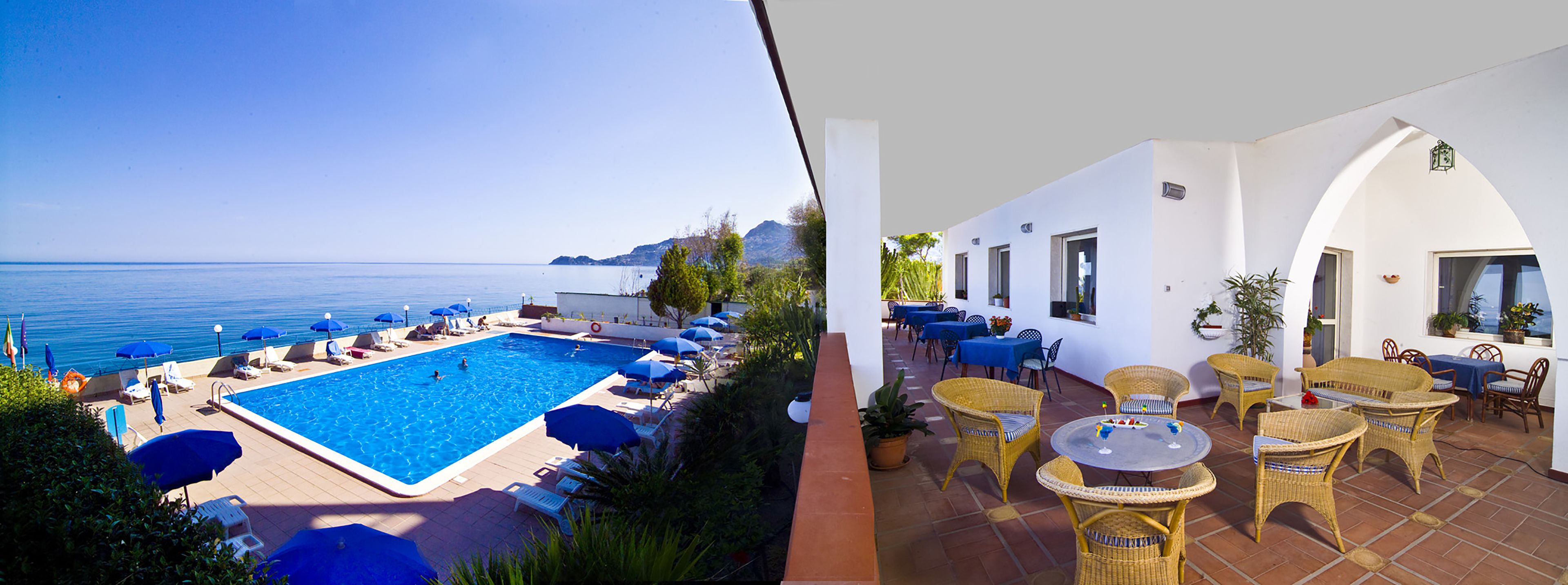 seasonal outdoor pool, open 9:00 am to 6:00 pm, pool umbrellas