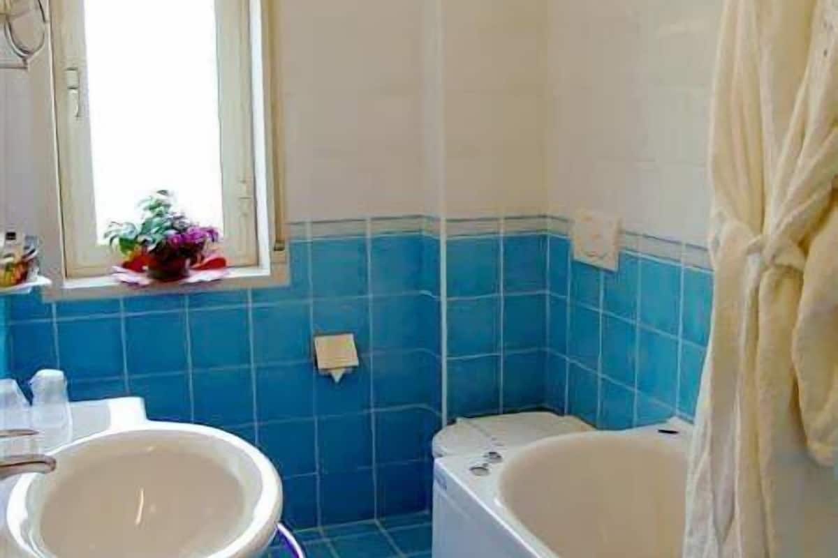 standard double room, balcony, mountain view | bathroom | free toiletries, hair dryer, bidet, towels