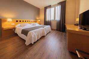 Roba de llit d'alta qualitat, minibar i caixa forta a l'habitació 