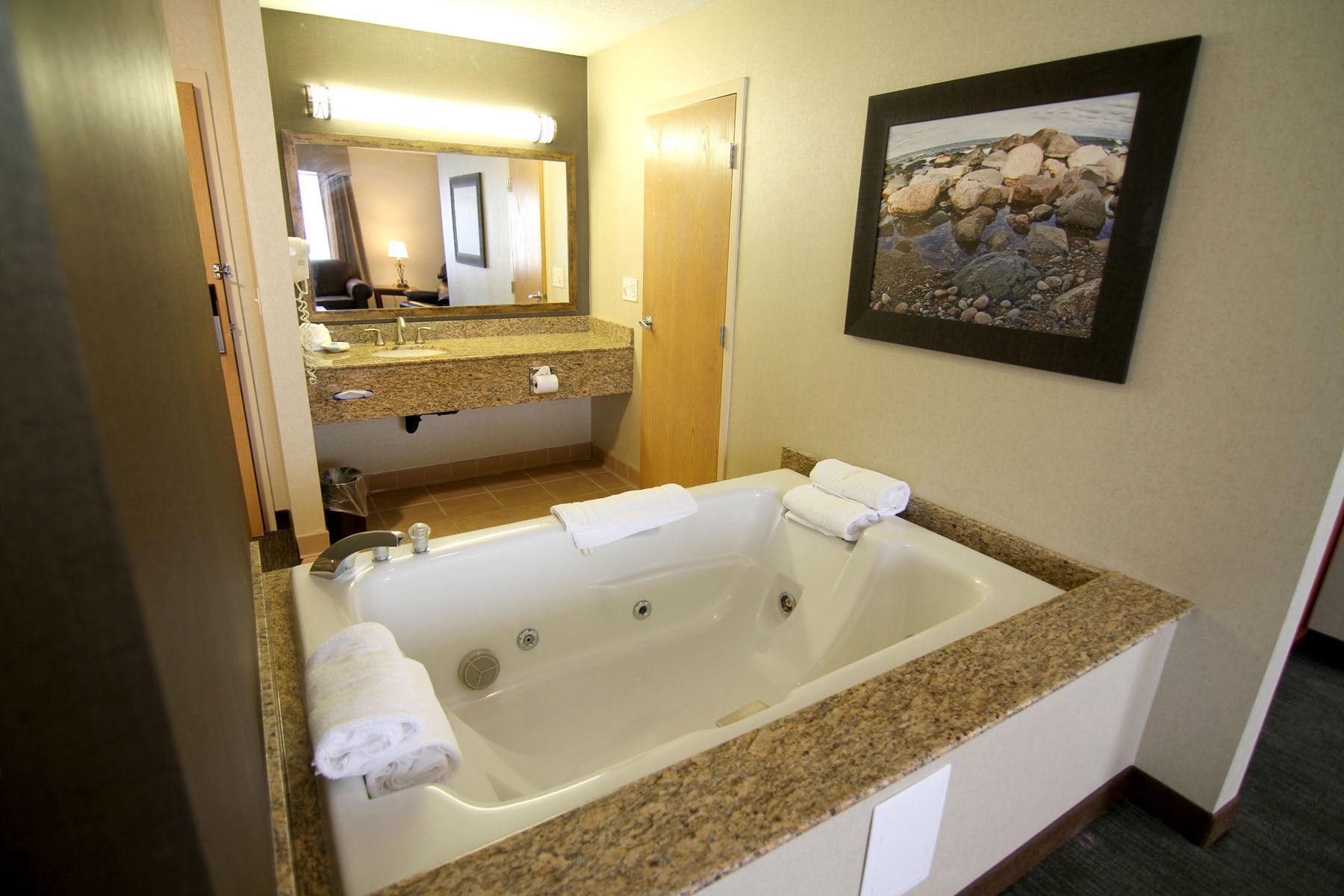 suite, jetted tub | bathroom | combined shower/bathtub, free toiletries, hair dryer, towels