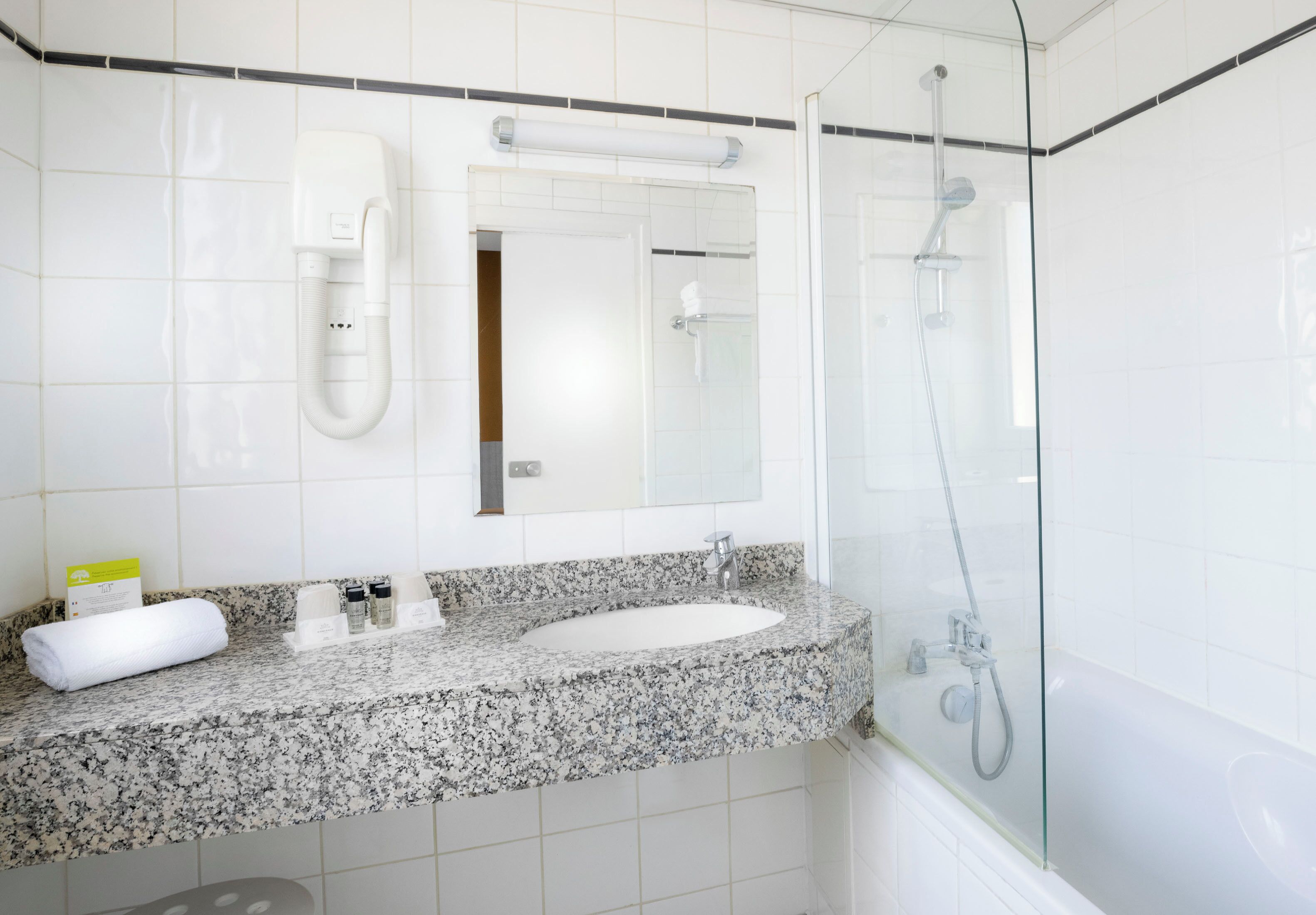 superior double room | bathroom | shower, hair dryer, slippers, towels