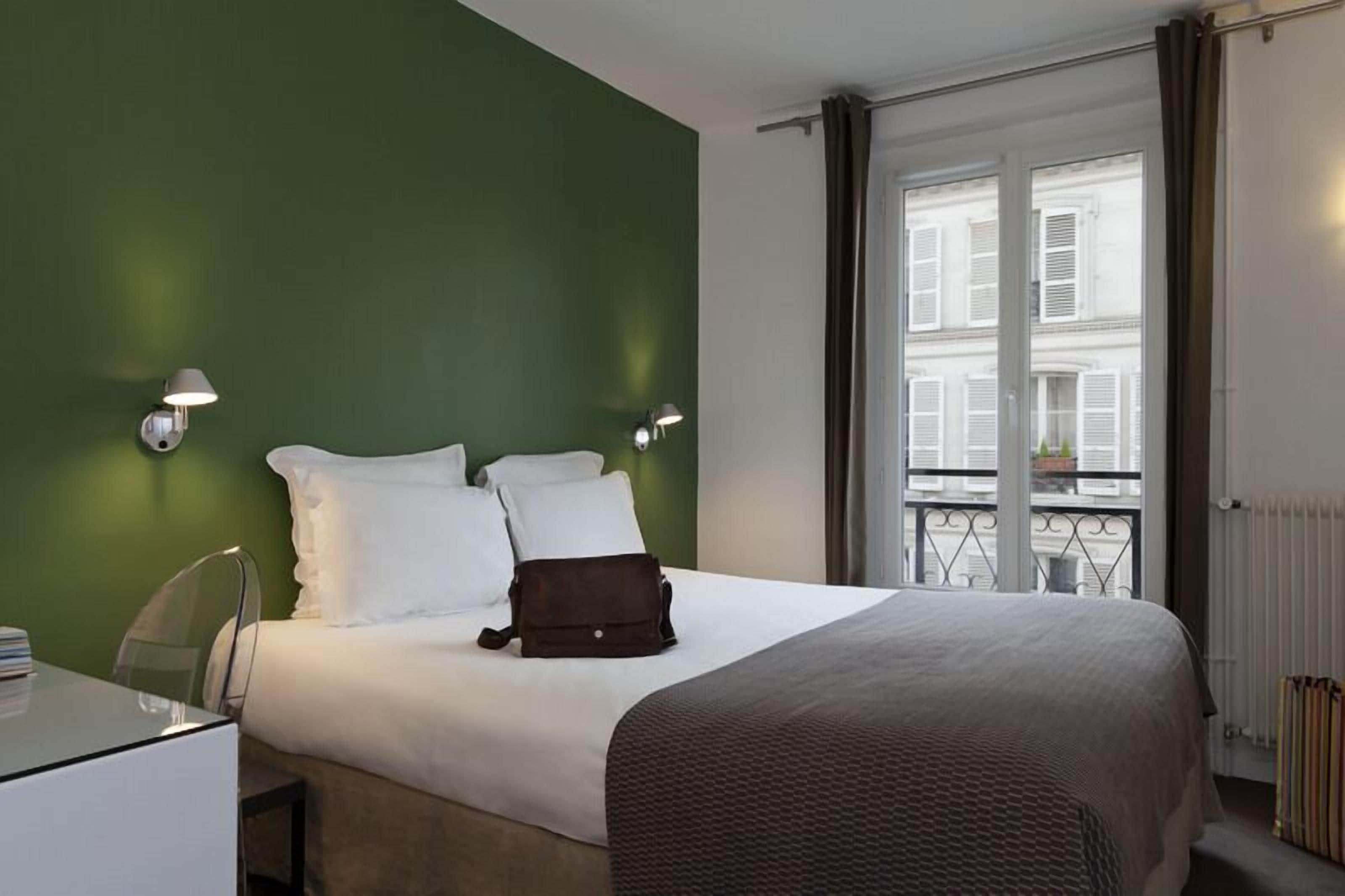 standard double room | premium bedding, minibar, in-room safe, desk