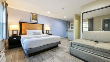 Suite, 1 cama Queen size y sofá cama, cocineta | Cortinas blackout, tabla de planchar con plancha y wifi gratis