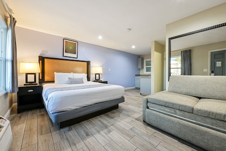 Suite, 1 Queen Bed with Sofa bed, Kitchenette | Blackout drapes, iron/ironing board, free WiFi, bed sheets