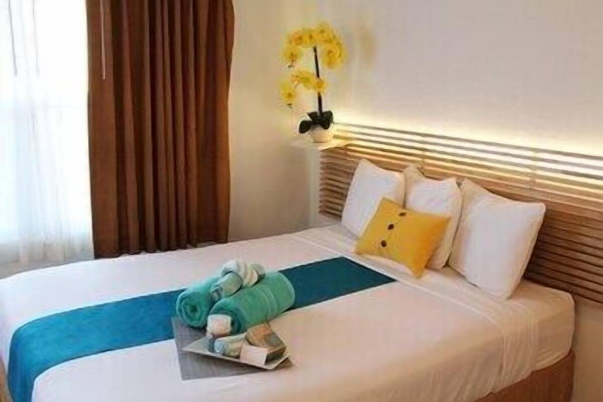 Cortinas blackout, tabla de planchar con plancha y wifi gratis