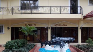 A building with a sign reading "CANTEEN" and "INFORMATION". - Tubod Flowing Waters Resort (Talisay)