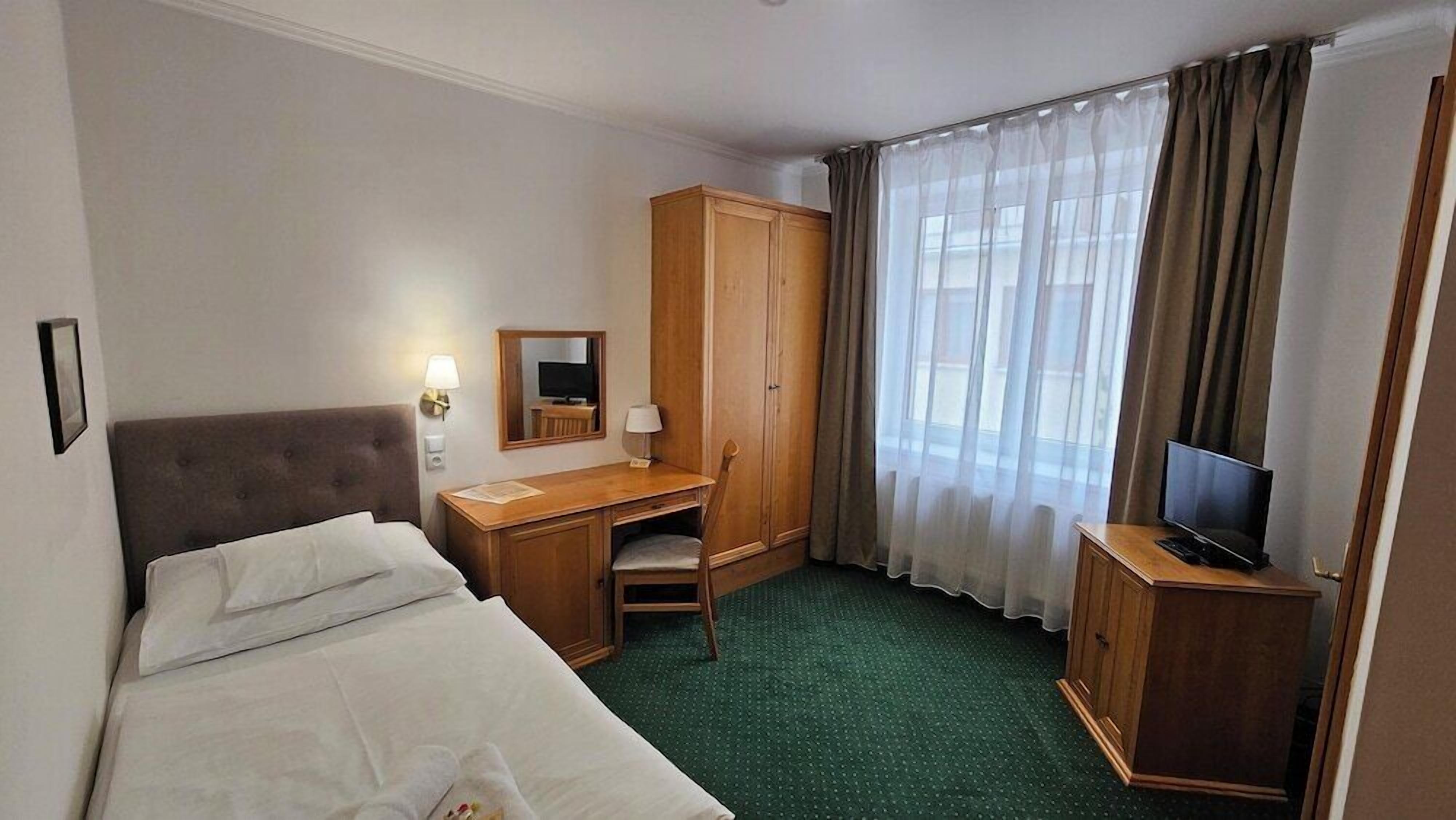 Desk, blackout curtains, free WiFi, bed sheets