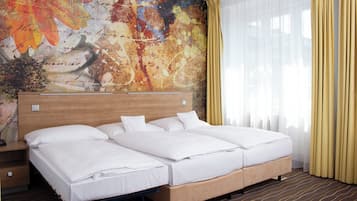 Chambre Triple | Literie hypoallergénique, minibar, coffres-forts dans les chambres