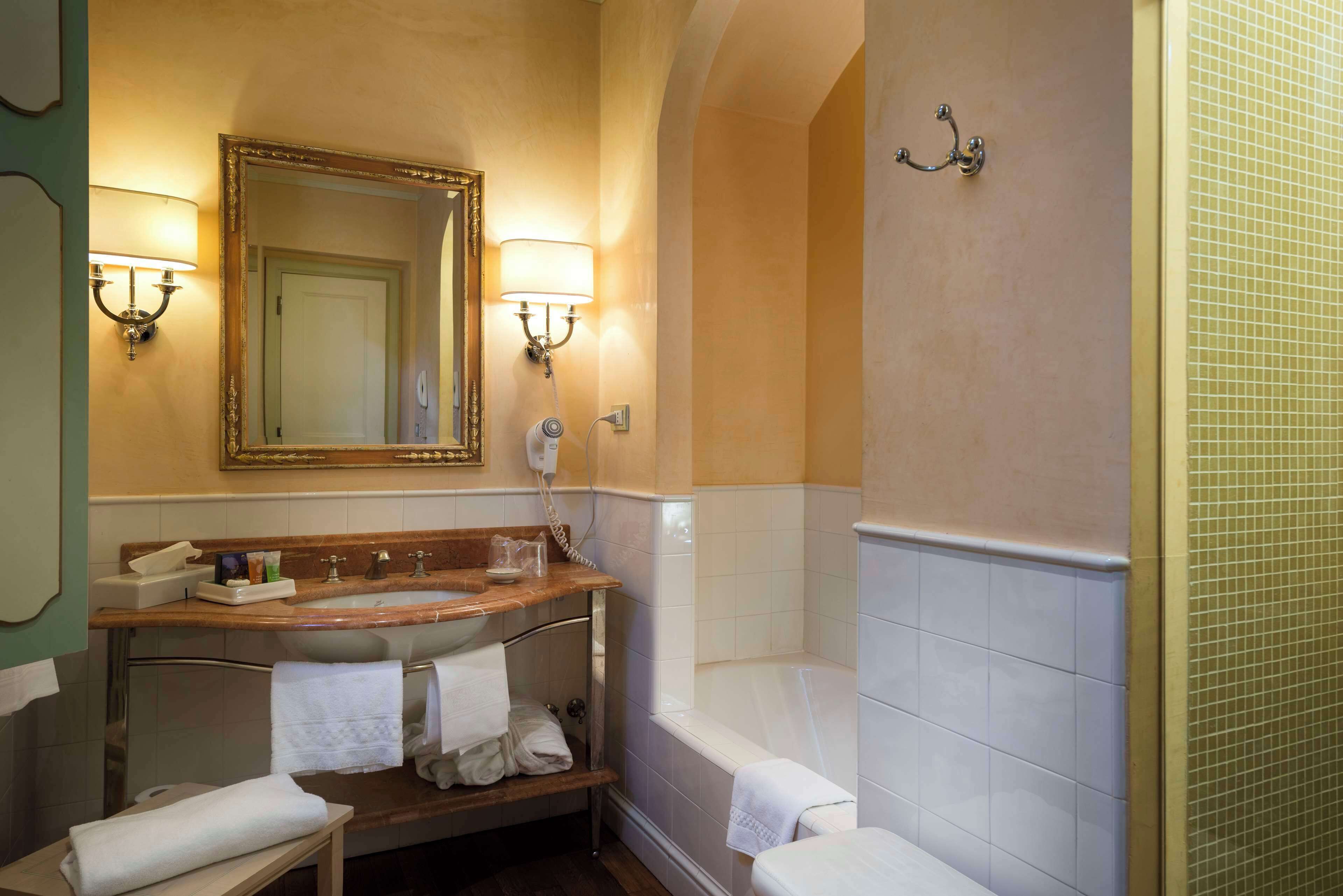 combined shower/bathtub, free toiletries, hair dryer, bathrobes