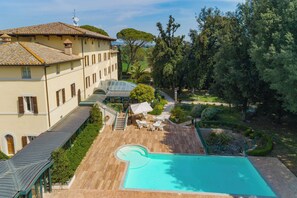 Seasonal outdoor pool, pool umbrellas, pool loungers