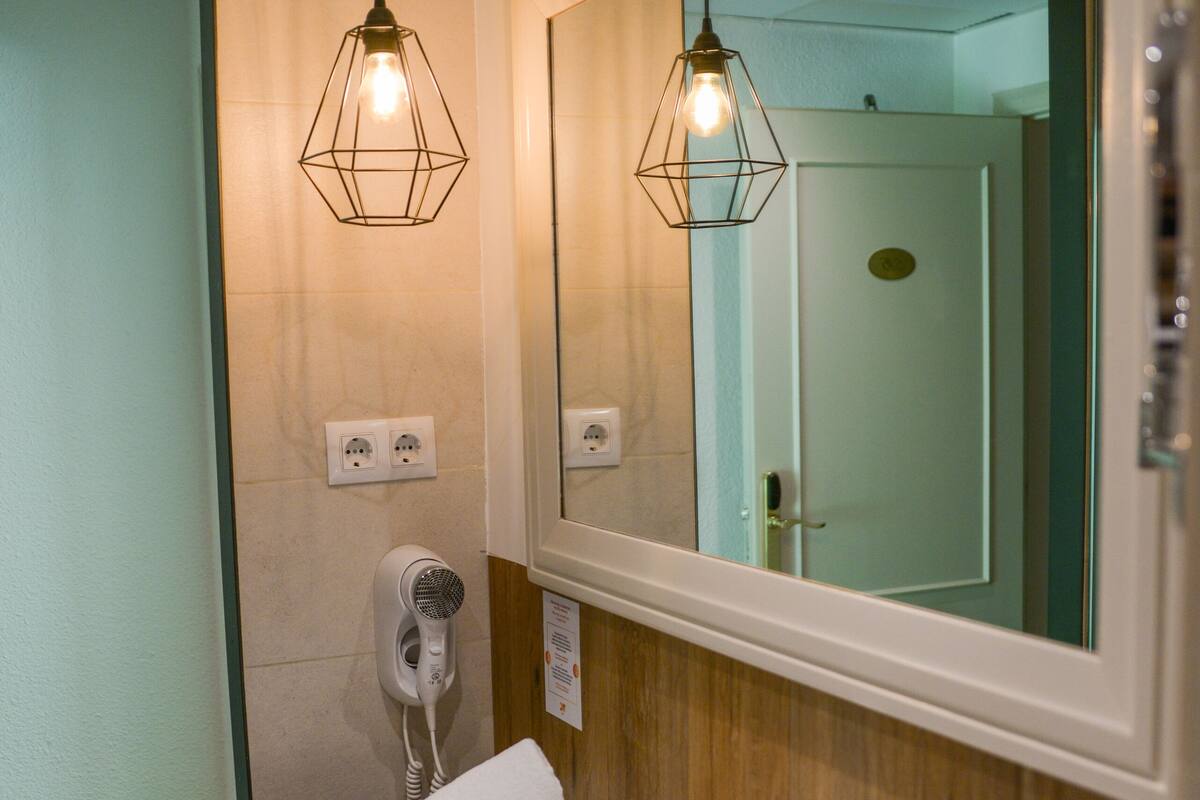 shower, eco-friendly toiletries, hair dryer, towels