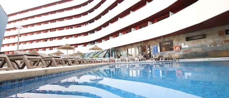 Seasonal outdoor pool, pool umbrellas, pool loungers