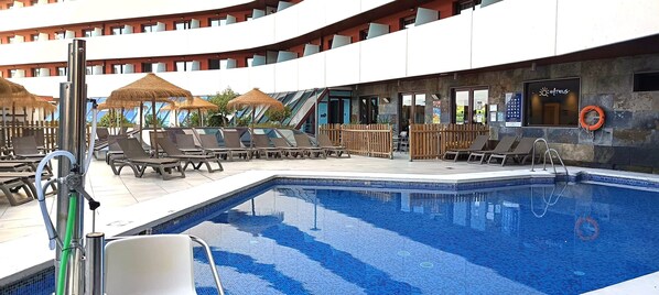 Seasonal outdoor pool, pool umbrellas, sun loungers