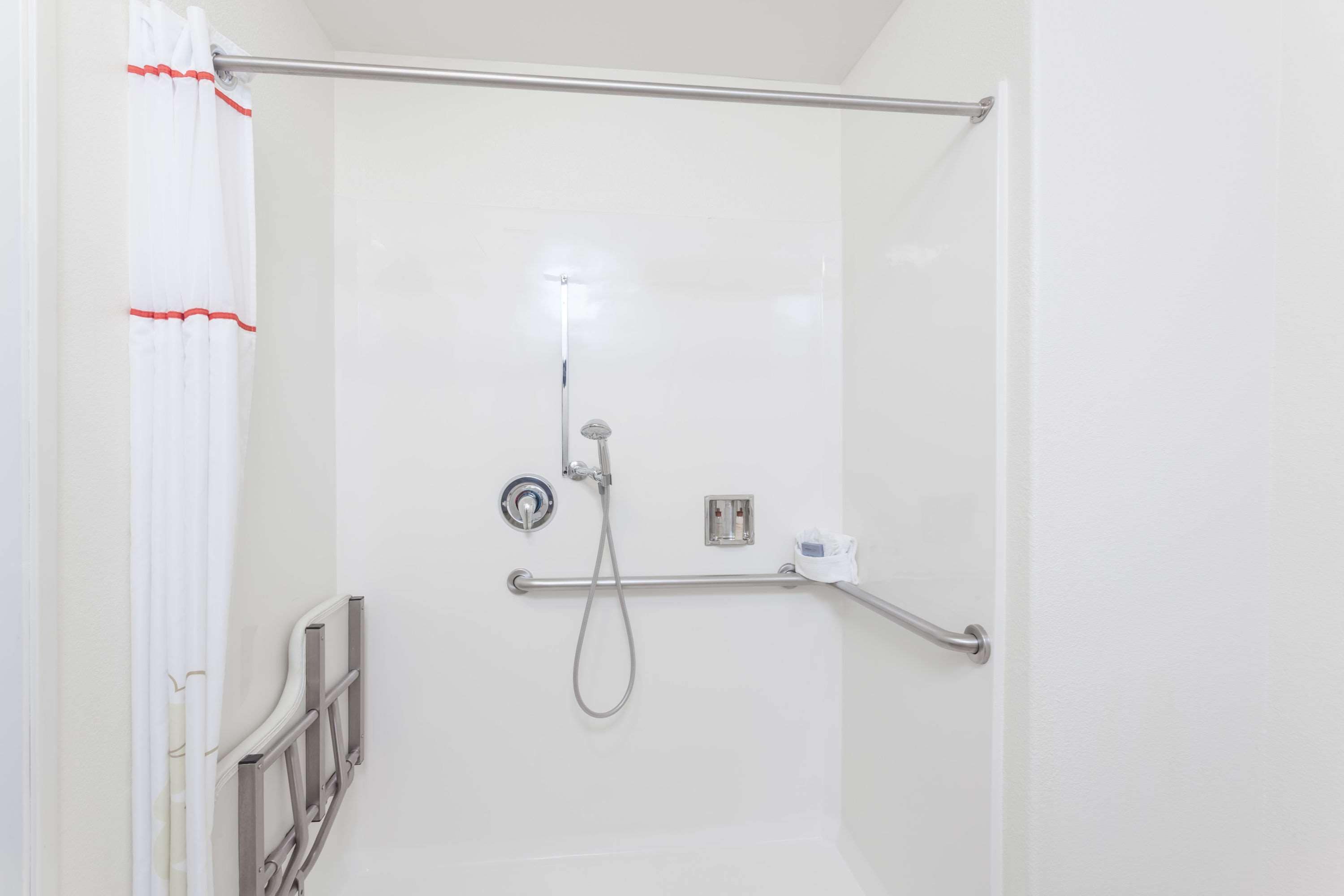 studio suite, 1 king bed, non smoking (mobility/hearing impaired) | bathroom | free toiletries, hair dryer, towels