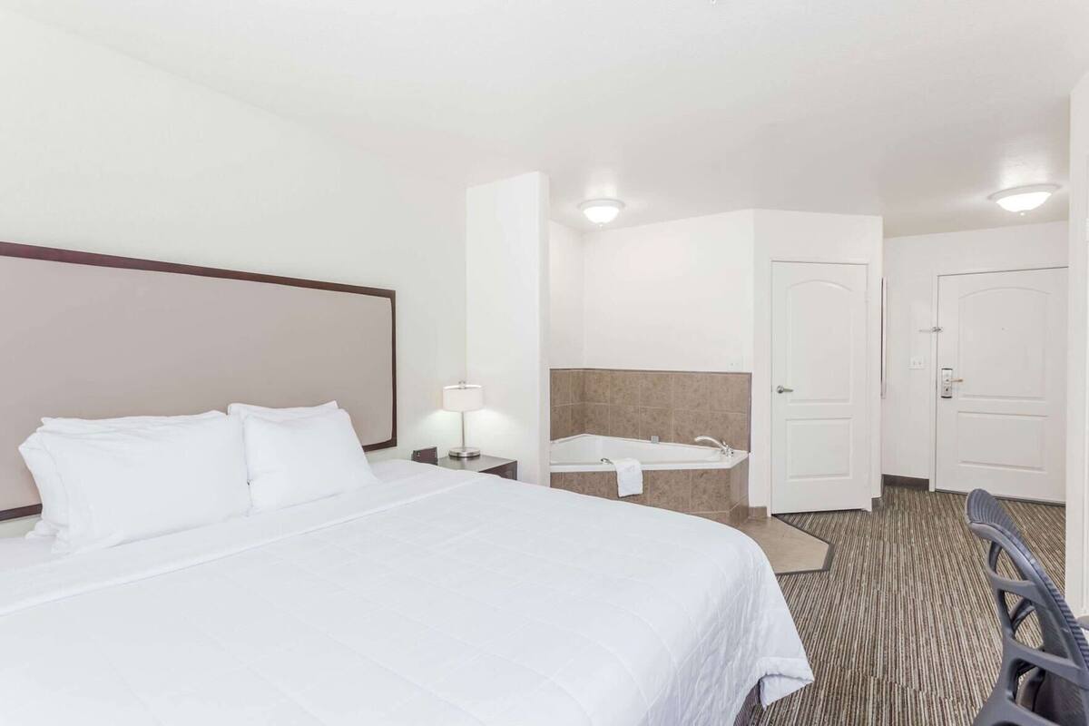 Premium bedding, pillowtop beds, desk, blackout drapes