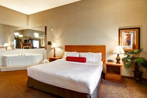 Superior Suite, 1 King Bed, Non Smoking | Living area | 32-inch TV with cable channels