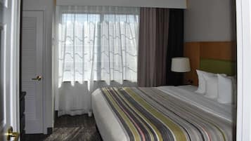 Suite, 1 Bedroom, Non Smoking | Premium bedding, in-room safe, desk, laptop workspace