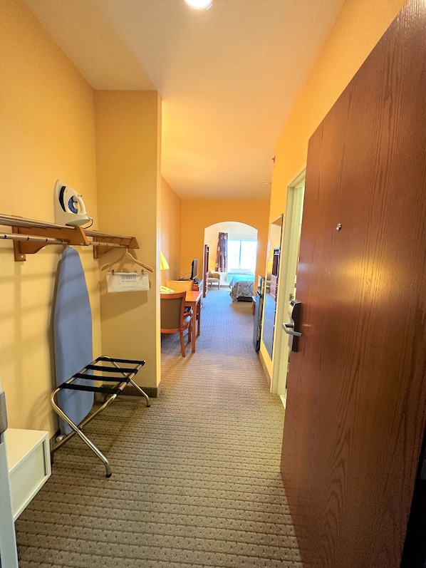 Suite, 1 King Bed | Desk, blackout drapes, iron/ironing board, free cribs/infant beds