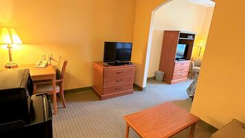 Suite, 1 King Bed | Desk, blackout curtains, iron/ironing board, free cots/infant beds