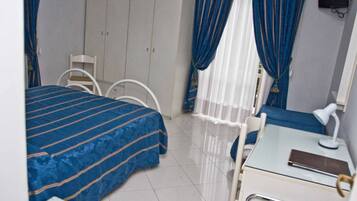 Copriletto in piuma, minibar, cassaforte in camera, tende oscuranti