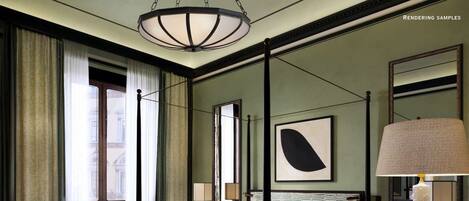 A spacious bedroom with a four-poster bed, a large mirror, and a modern chandelier.