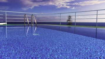 Outdoor pool, open 9:30 AM to 7:30 PM, pool loungers