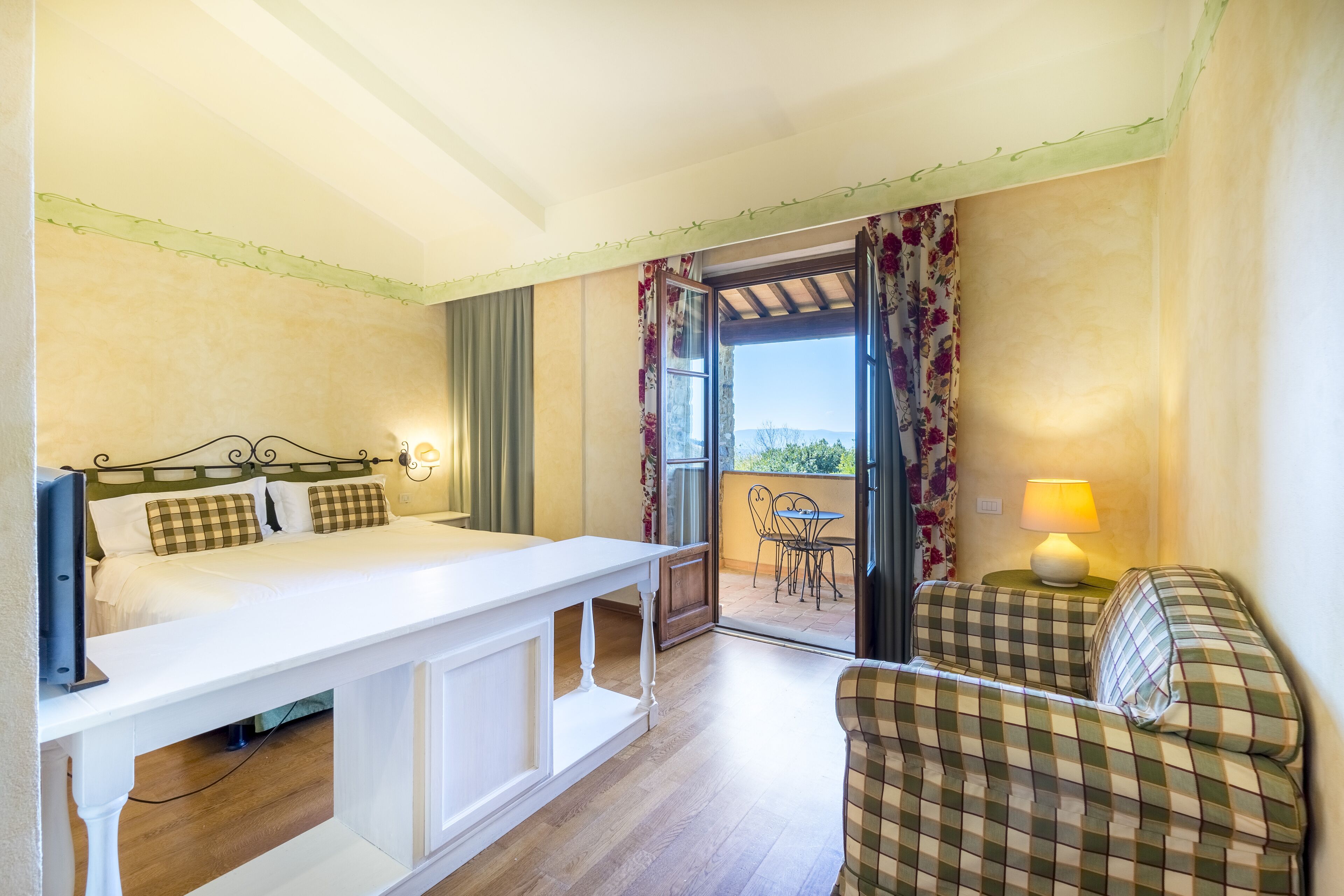 superior room | minibar, in-room safe, desk, iron/ironing board