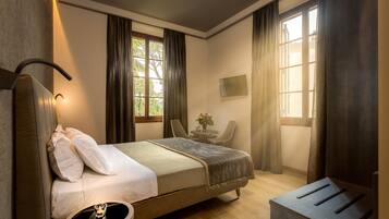 Deluxe Double Room, Garden View | In-room safe, desk, free WiFi, bed sheets