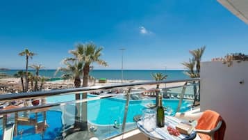 2 outdoor pools, pool umbrellas, sun loungers