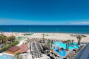 2 outdoor pools, pool umbrellas, pool loungers