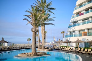 2 outdoor pools, pool umbrellas, pool loungers