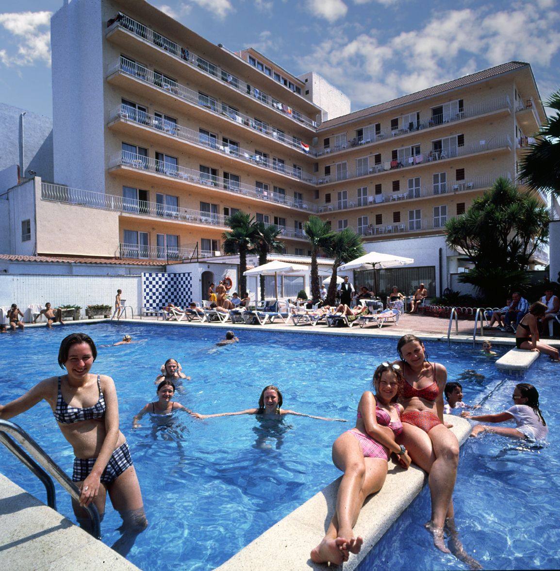 outdoor pool, pool umbrellas, pool loungers