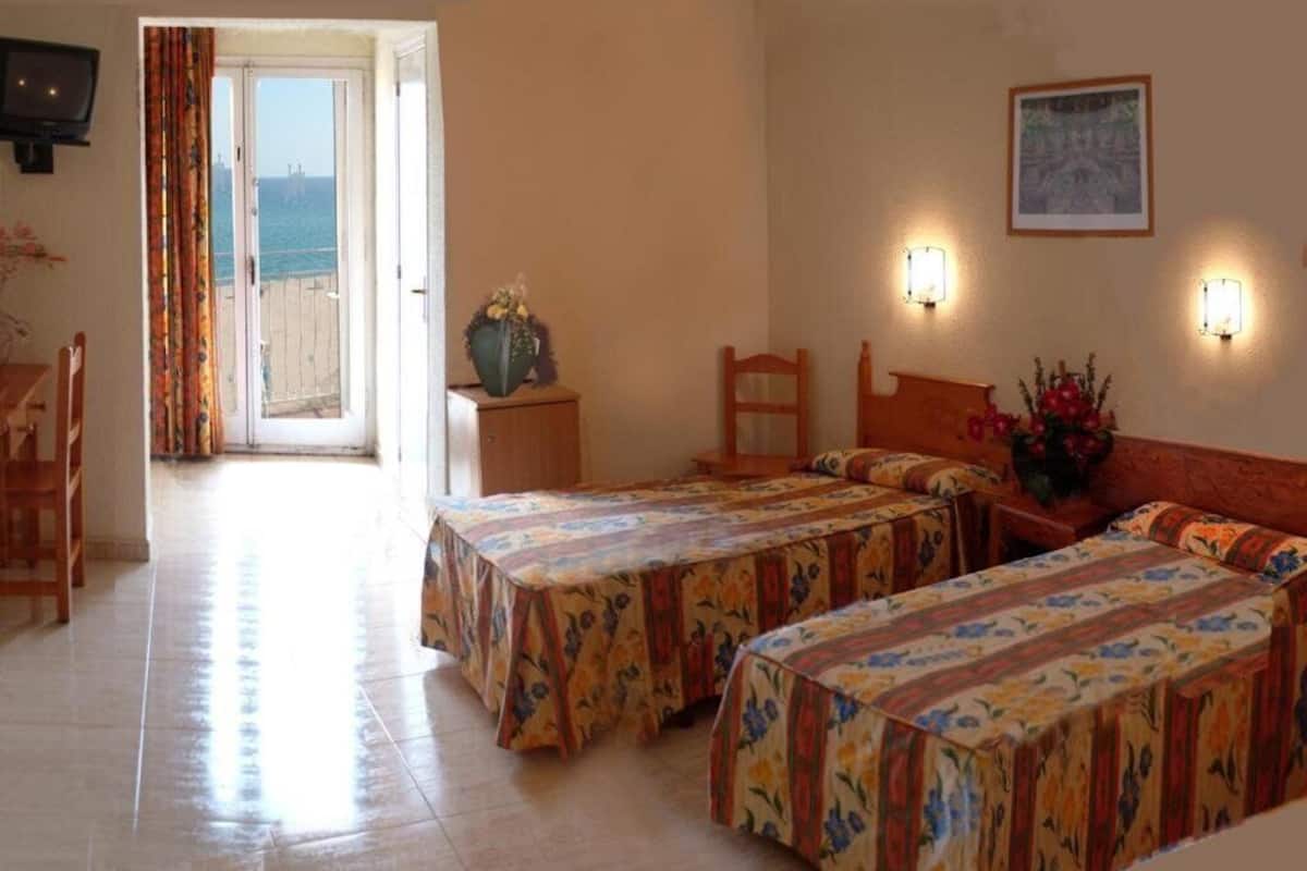 desk, blackout curtains, cots/infant beds, free wifi