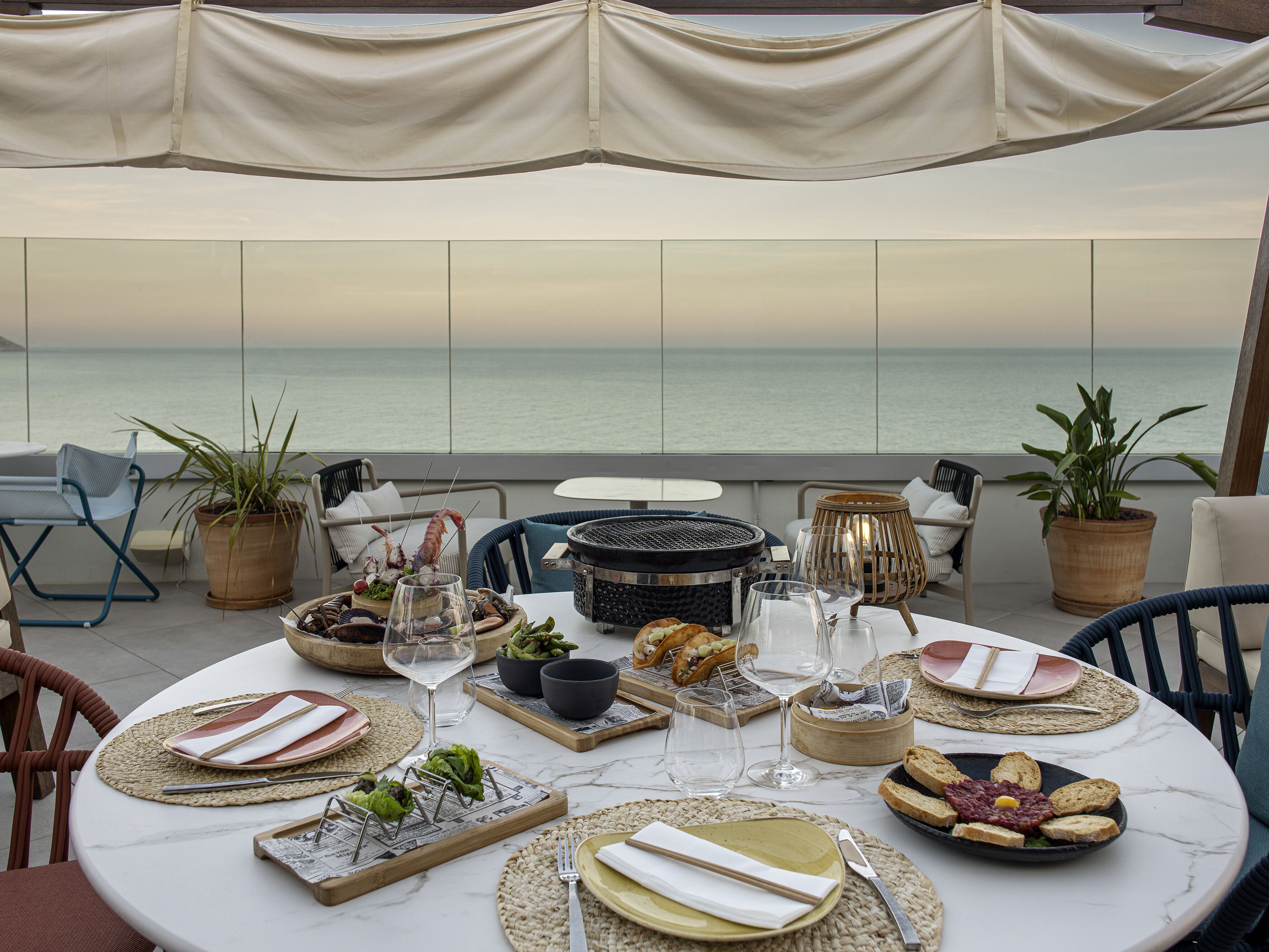 Lunch, dinner served; Mediterranean cuisine, beach views 