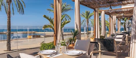 Lunch, dinner served; Mediterranean cuisine, beach views