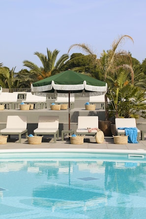 Outdoor pool, pool umbrellas, pool loungers