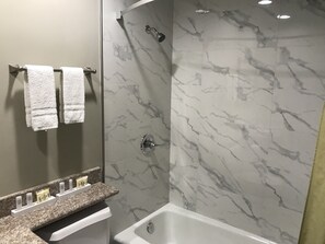 Shower, free toiletries, hair dryer, towels