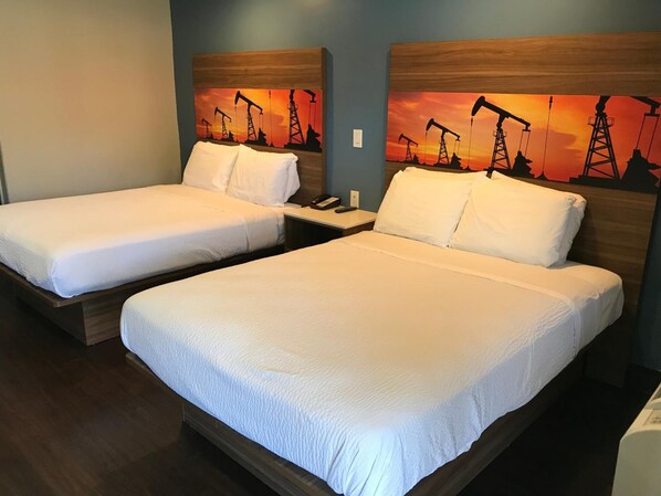 Premium bedding, desk, blackout curtains, iron/ironing board