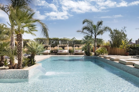 2 outdoor pools, pool umbrellas, pool loungers. Luna Club Hotel Yoga & Spa