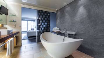 Shower, eco-friendly toiletries, hair dryer, towels