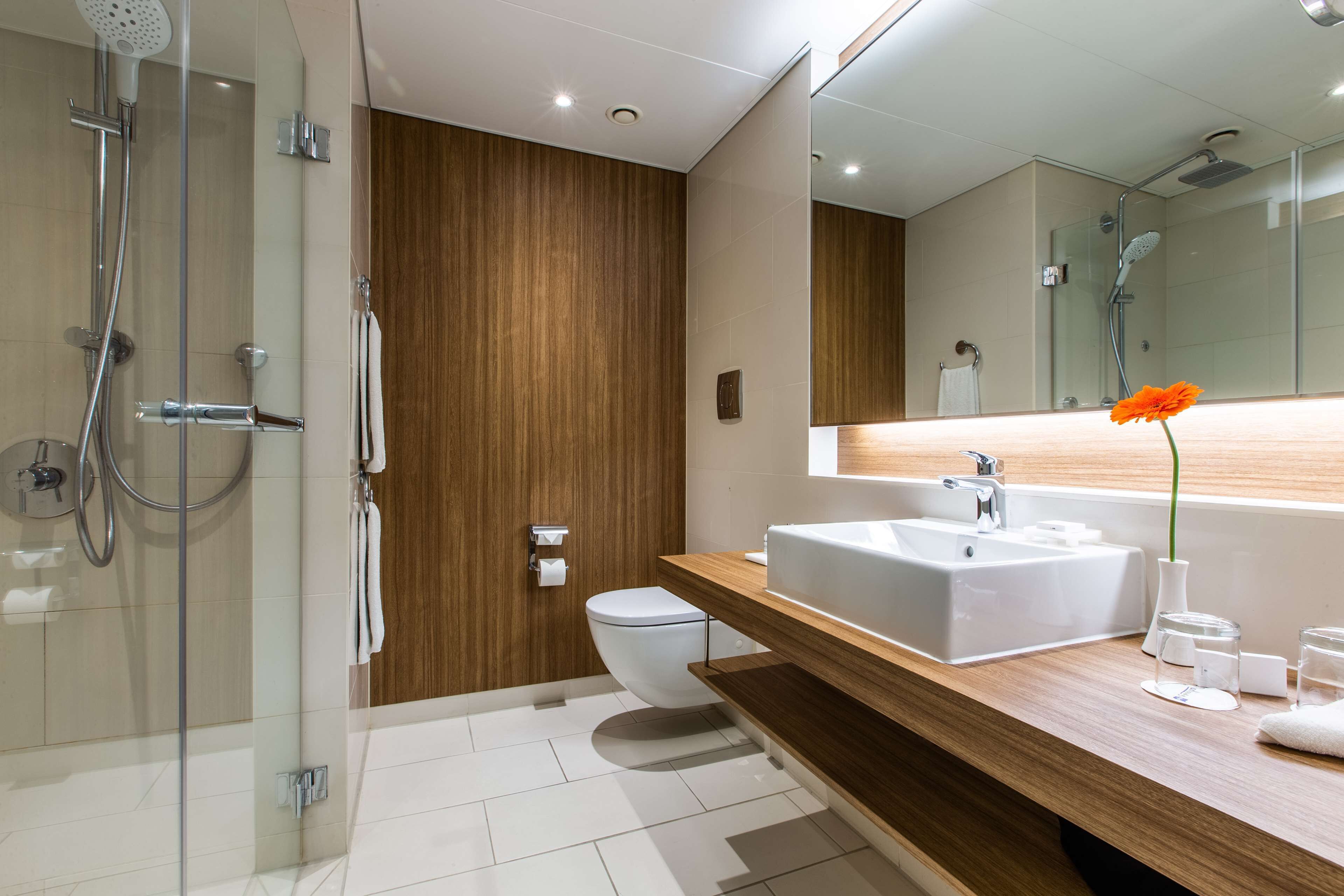 shower, eco-friendly toiletries, hair dryer, towels