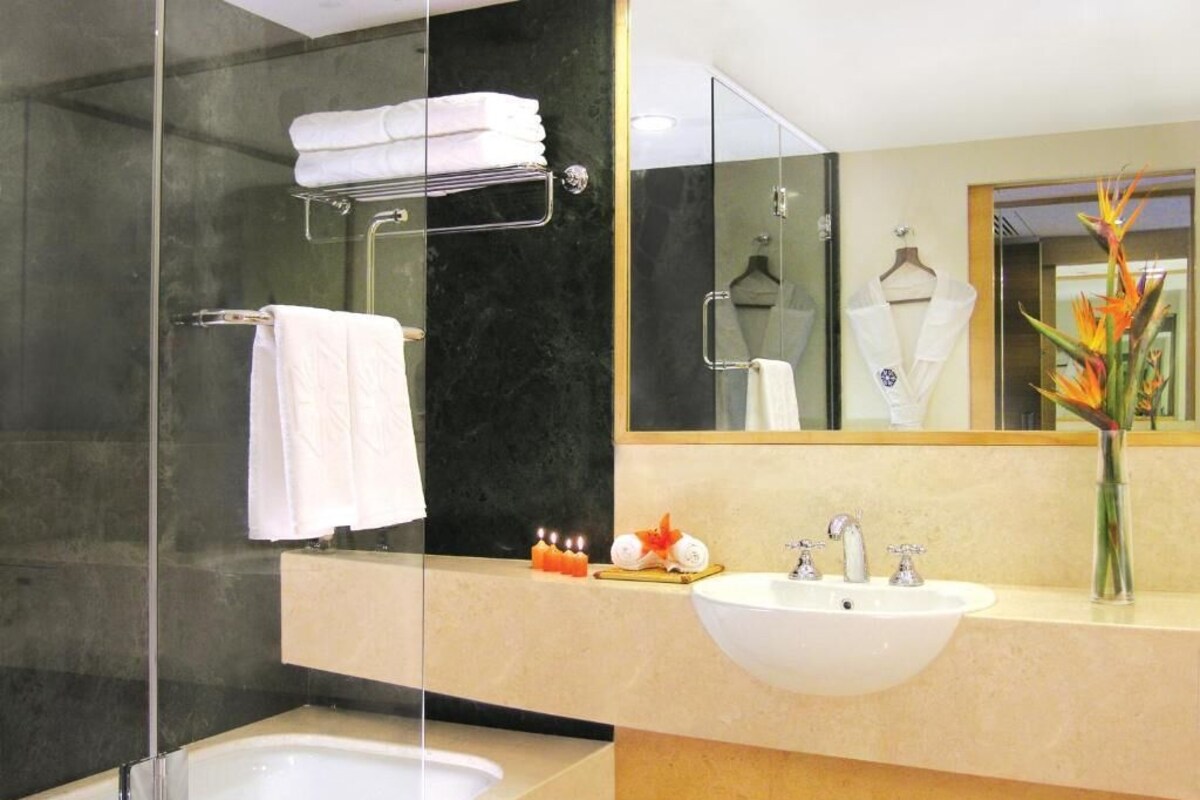 Bathroom | Hair dryer, slippers, towels