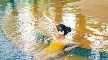 Indoor pool, 3 outdoor pools, open 8:00 AM to 8:00 PM, pool umbrellas