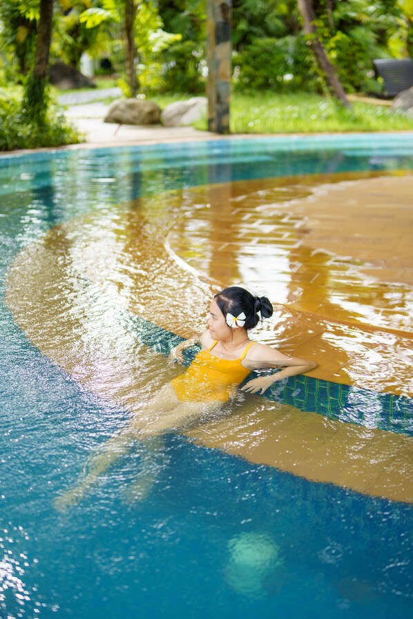 Indoor pool, 3 outdoor pools, open 8:00 AM to 8:00 PM, pool umbrellas
