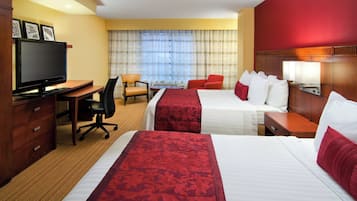 Premium bedding, down duvets, desk, laptop workspace